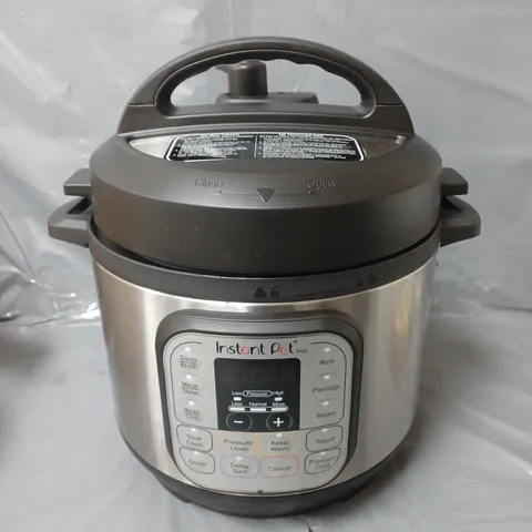 BOXED INSTANT POT DUO MULTI-USE PRESSURE COOKER