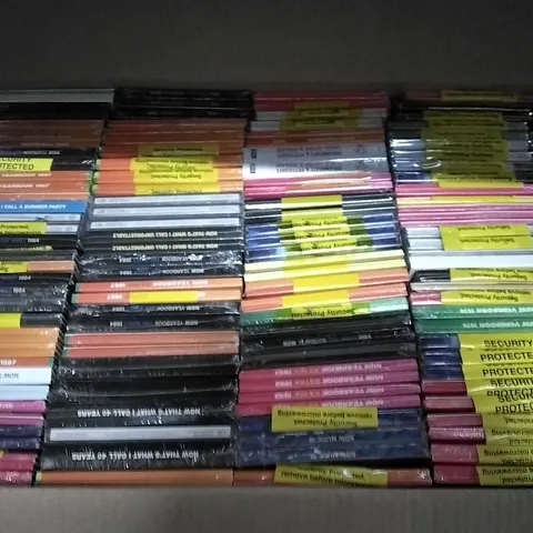 APPROXIMATELY 100 ASSORTED CDS AND DVDS TO INCLUDE NOW MUSIC 18, NOW YEARBOOK, AND NOW THAT'S WHAT I CALL ETC.