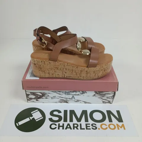 BOXED PAIR OF LASANDRA TAN LEATHER CROSS OVER ELASTICATED SANDAL - SIZE 40