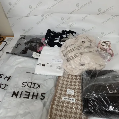 LARGE BOX OF ASSORTED CLOTHING ITEMS IN VARIOUS COLOURS AND SIZES INCLUDING TROUSERS , TOPS AND JUMPERS