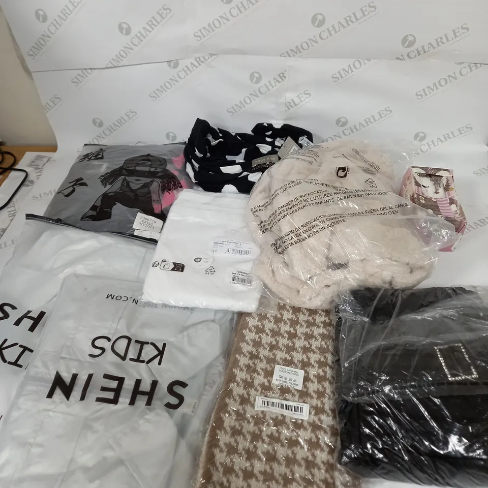 LARGE BOX OF ASSORTED CLOTHING ITEMS IN VARIOUS COLOURS AND SIZES INCLUDING TROUSERS , TOPS AND JUMPERS 