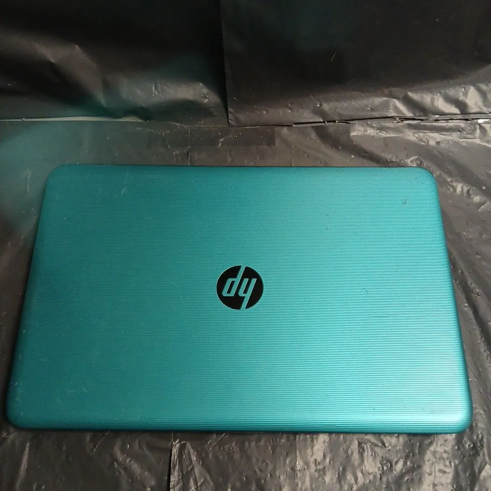 HP LAPTOP IN TEAL BLUE