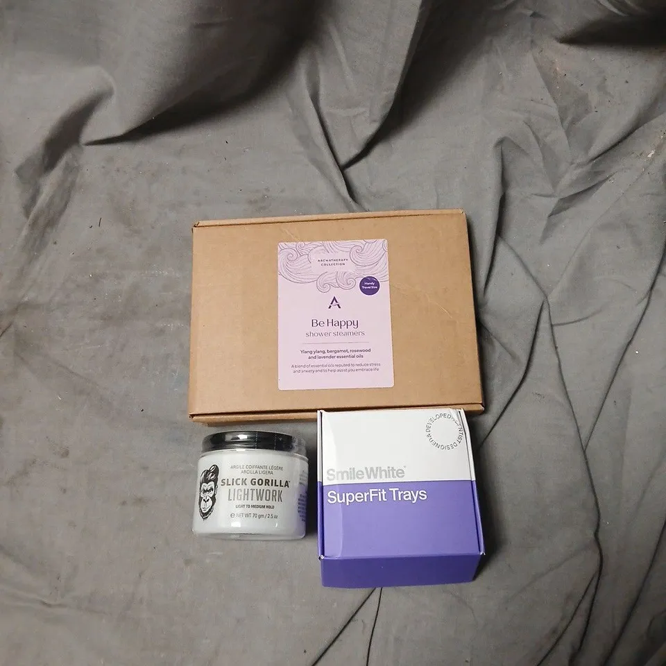 APPROXIMATELY  20 ITEMS INCLUDING  ASSORTED HEALTH & BEAUTY PRODUCTS – OLAY SKINCARE, BE HAPPY SHOWER STEAMERS, SLICK GORILLA HAIR PRODUCT, SMILEWHITE TRAYS .