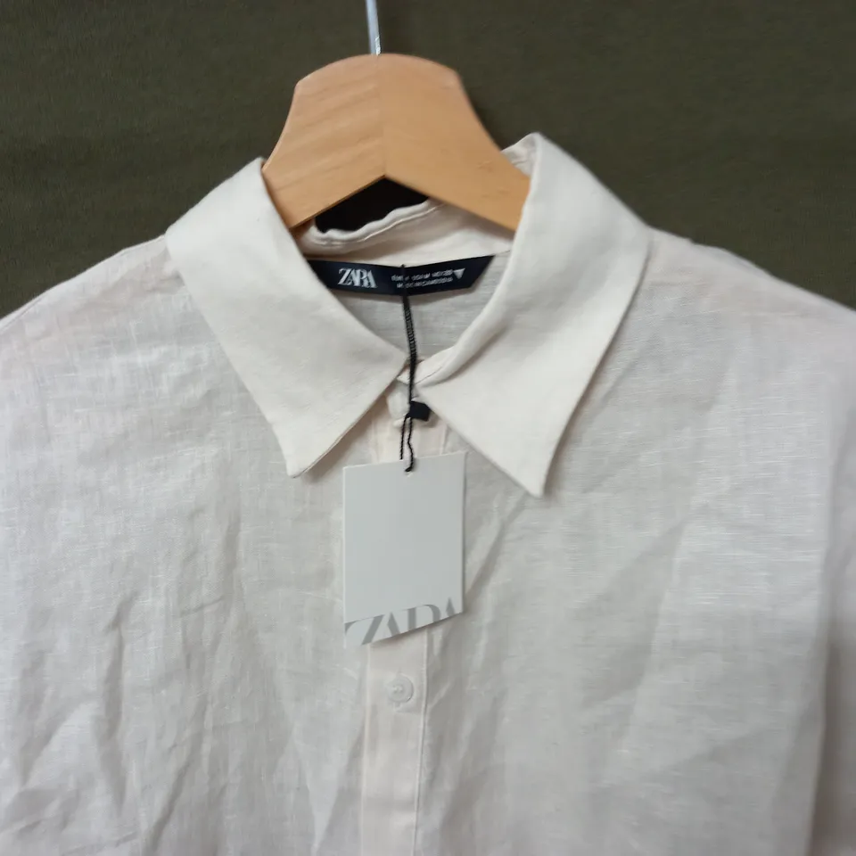 ZARA LONG SLEEVE SHIRT WITH OFF CUT DESIGN - EUR M