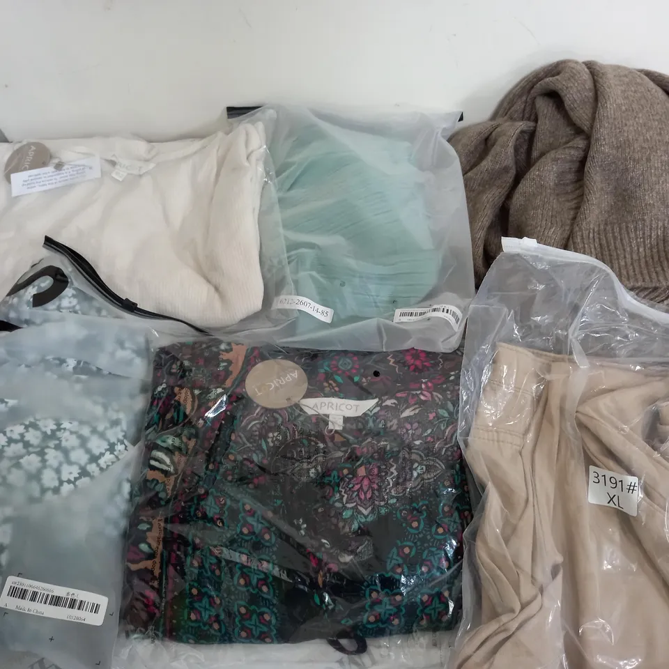 LARGE BOX OF ASSORTED CLOTHING ITEMS IN VARIOUS COLOURS AND SIZES INCLUDING TROUSERS , TOPS AND JUMPERS