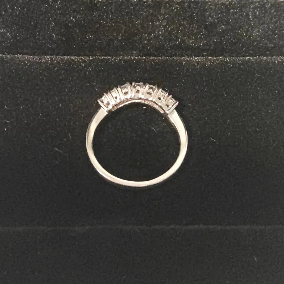 PLATINUM CURVED SEVEN STONE HALF ETERNITY RING SET WITH NATURAL DIAMONDS 
