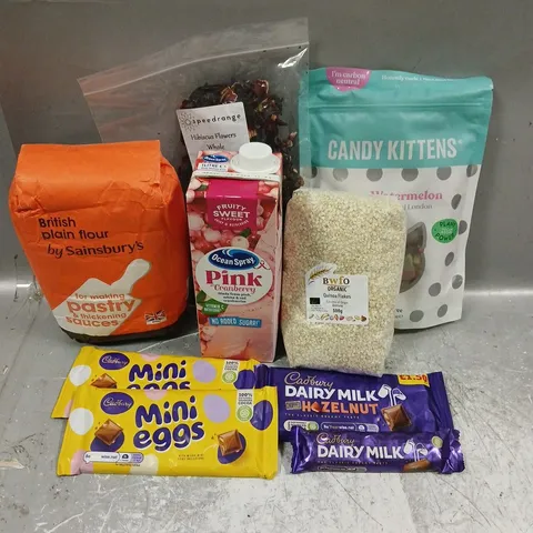 APPROXIMATELY 10 ASSORTED FOOD ITEMS TO INCLUDE - CANDY KITTENS SOUR WATERMELON - MINI EGGS CHOCOLATE - SPEEDRANGE HIBISCUS FLOWERS - ETC