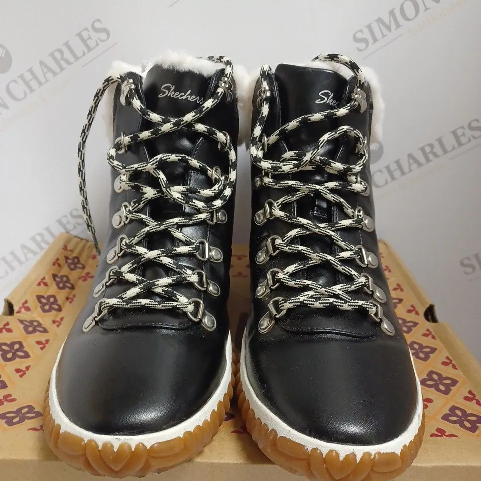 BOXED SKECHERS NO REGRET BOOTS, BLACK - SIZE 6