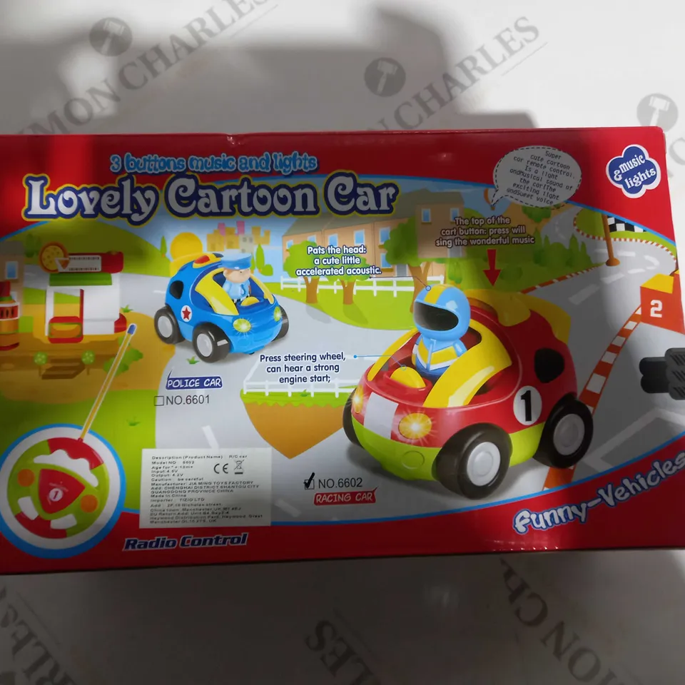 BOXED JAKMEAN LOVELY CARTOON CAR , WITH MUSIC AND LIGHTS 