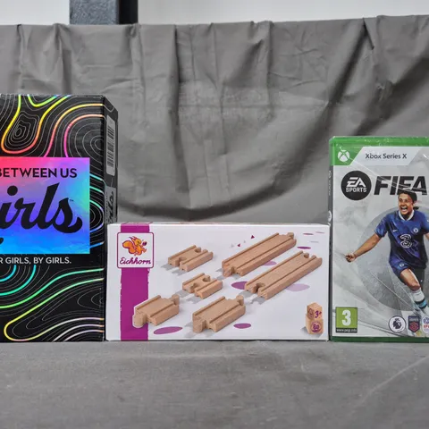 BOX OF APPROXIMATELY 5 ASSORTED TOYS AND GAMES TO INCLUDE BETWEEN US GIRLS PARTY CARD GAME, EICHHORN WOODEN TRAIN TRACKS, FIFA 23 XBOX SERIES X GAME, ETC