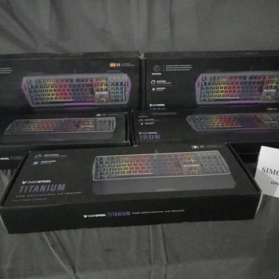 5 BOXED OVERSTEEL KEYBOARDS 