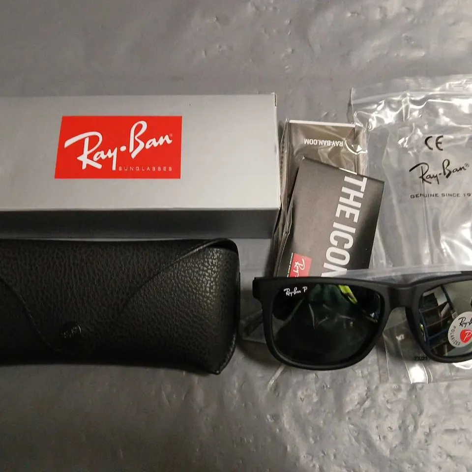 BOXED PAIR OF RAY BAN POLARISED BLACK FRAMED GLASSES