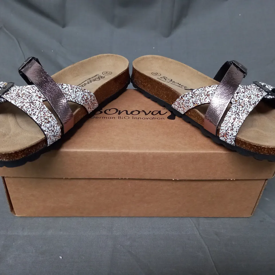 BOXED PAIR OF BONOVA OPEN TOE FLAT SANDALS IN BRONZE SIZE 4