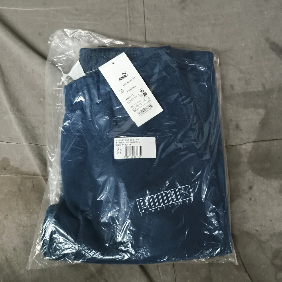 BAGGED PUMA KEY GRAPHIC PANTS IN PERSIAN BLUE SIZE 11-12 YEARS