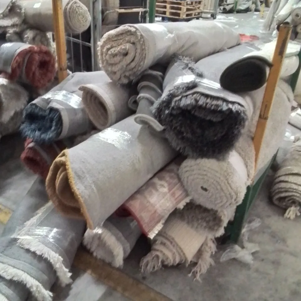 STILLAGE OF APPROXIMATELY 20 QUALITY DESIGNER RUGS