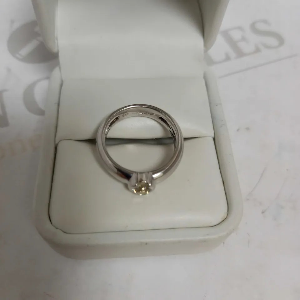 DESIGNER 18CT WHITE GOLD SOLITAIRE RING SET WITH AN OLD CUT DIAMOND WEIGHING +-0.52CT