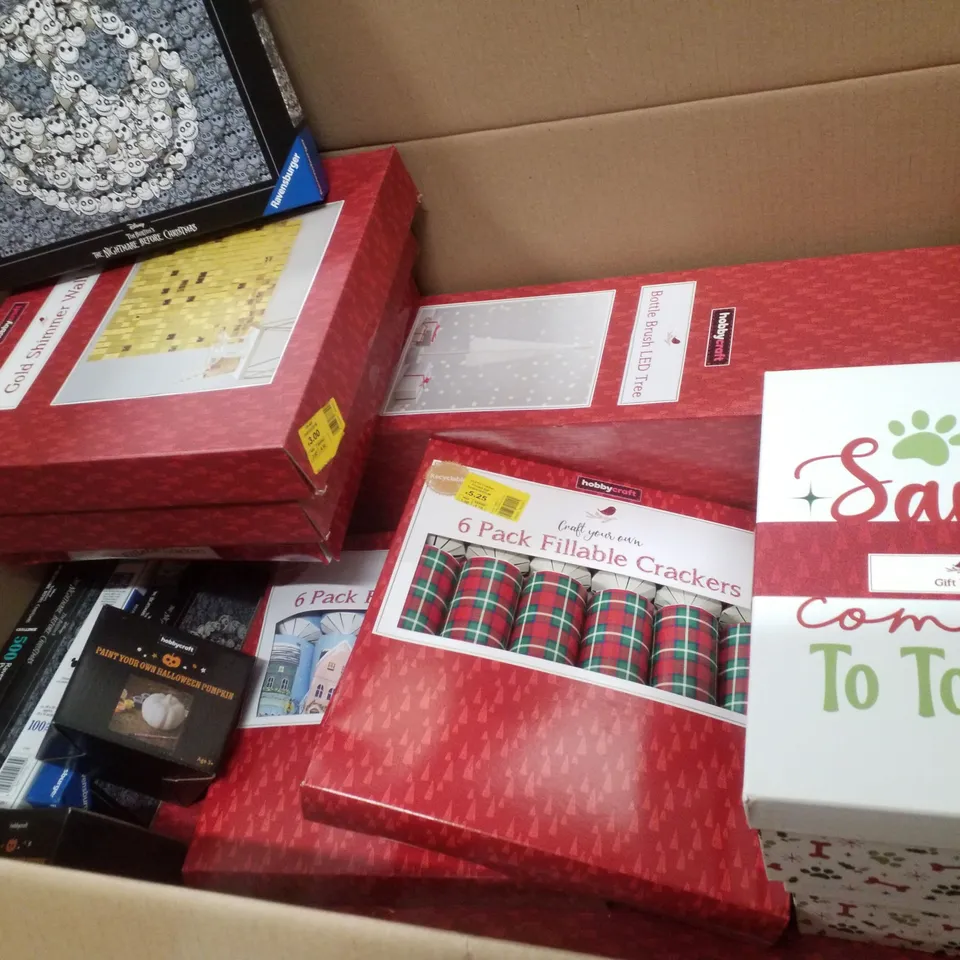 PALLET CONTAINING ASSORTED CHRISTMAS & HALLOWEEN PRODUCTS & DECORATIONS INCLUDING BOTTLE BRUSH LED TREE, FILLABLE CRACKERS, CHRISTMAS GIFT BOX, THE NIGHTMARE BEFORE CHRISTMAS  500PC PUZZLE & PAINT YOU