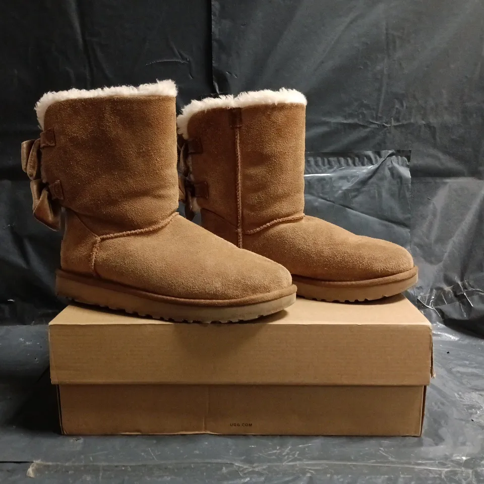 BOXED PAIR OF UGG BAILEY BOW VELVET RIBBON SHOES IN CHESTNUT SIZE UK 6