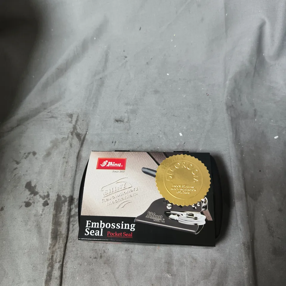 APPROXIMATELY 12 ASSORTED ITEMS INCLUDING TENNIS BALLS , EMBOSSING SEAL AND ARTISTS AIR DRY CLAY 