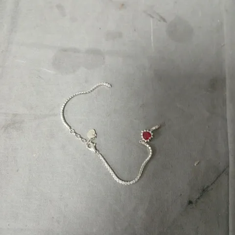 SILVER BRACELET WITH RED GEMSTONE CENTRE