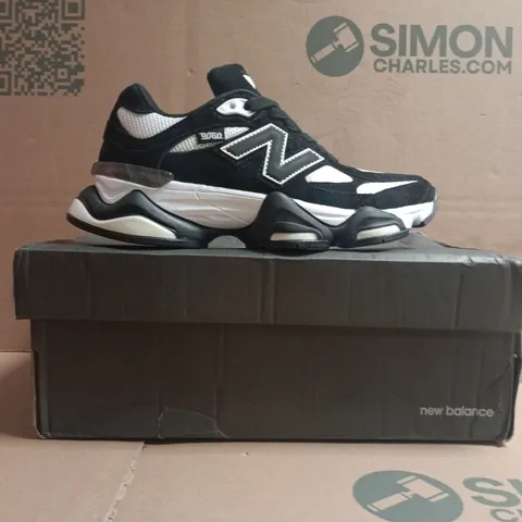 BOXED PAIR OF NEW BALANCE 9060 TRAINERS BLACK/WHITE SIZE UK 4.5