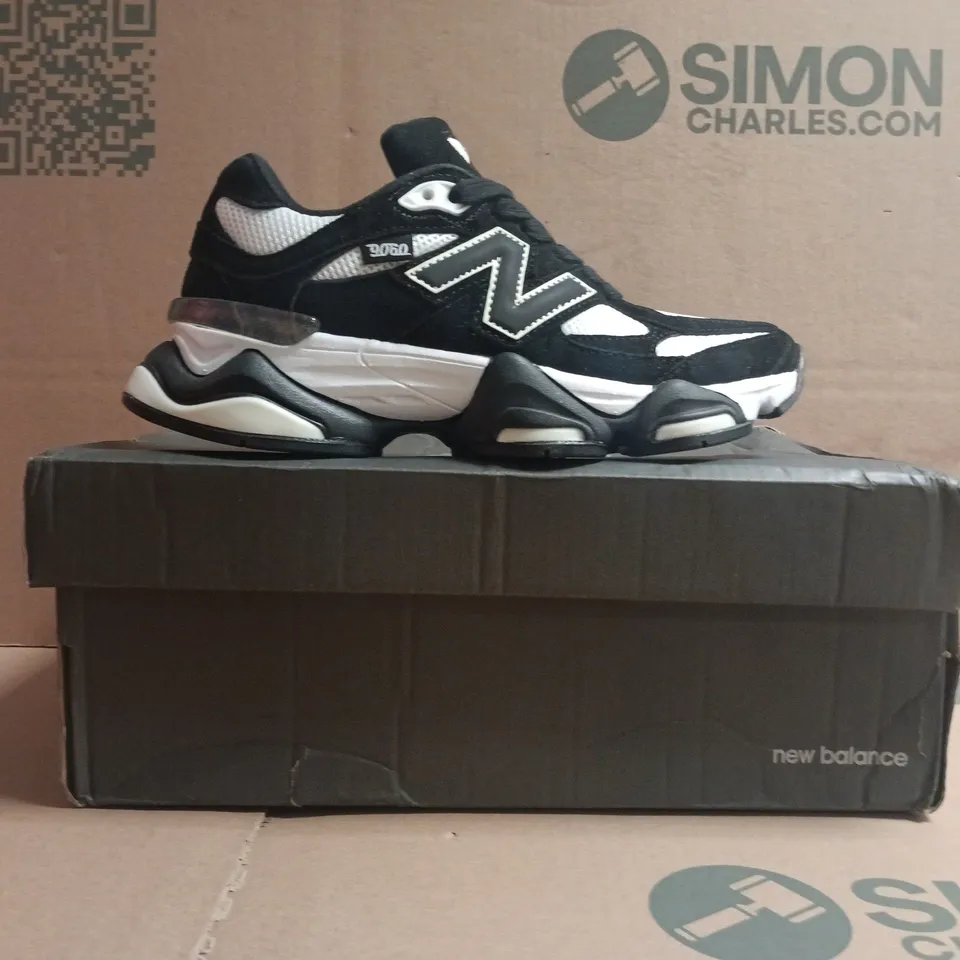 BOXED PAIR OF NEW BALANCE 9060 TRAINERS BLACK/WHITE SIZE UK 4.5