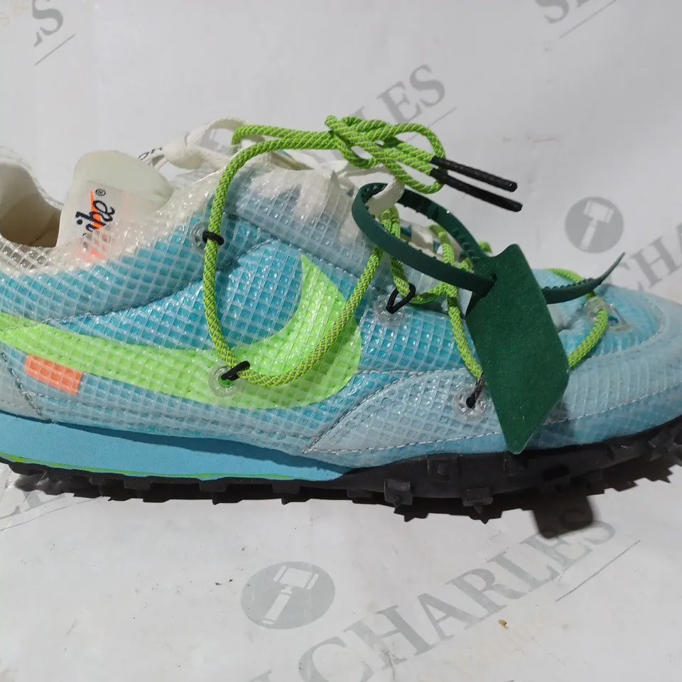 BOXED PAIR OF NIKE SHOES IN LIGHT BLUE/GREEN UK SIZE 7