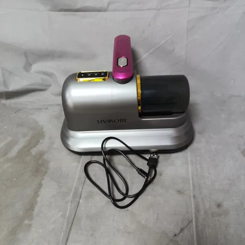LIVMORE CORDLESS UV SANITISING BED END MITE CLEANER – BASE UNIT WITH PINK HANDHELD WAND, BOXED