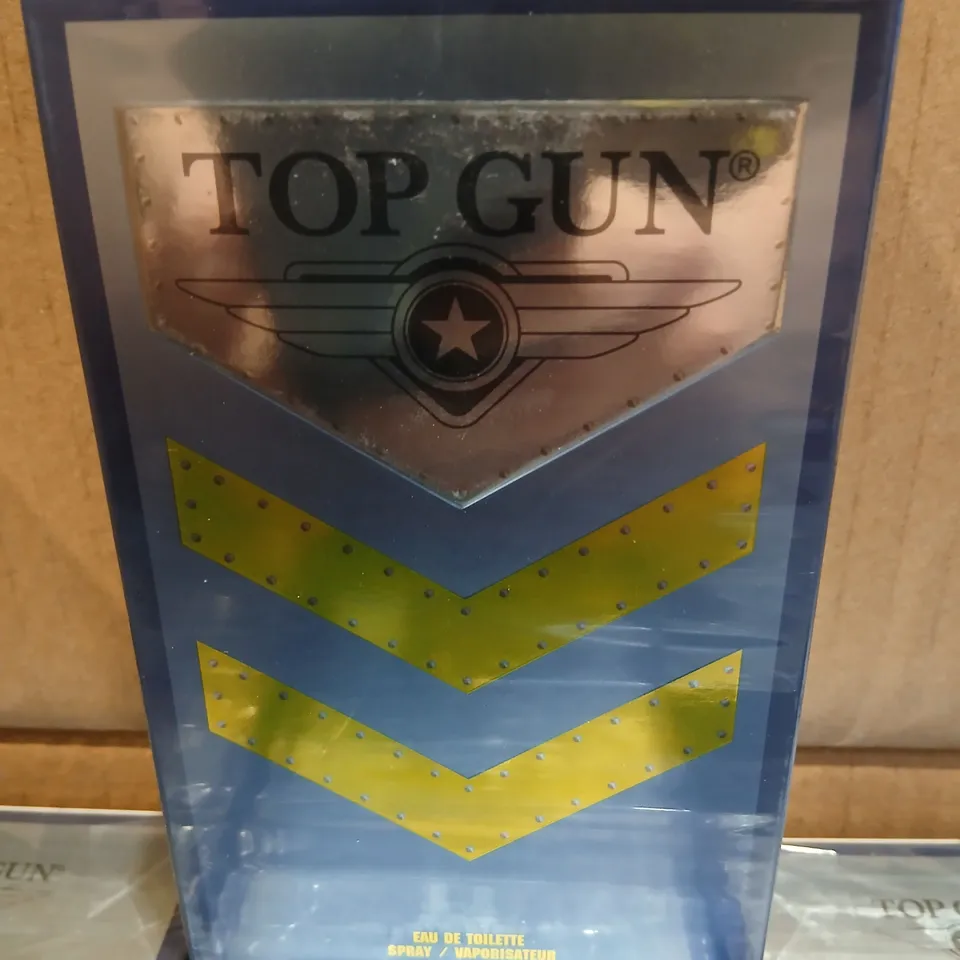 APPROXIMATELY 24 TOP GUN EAU DE TOILETTE SPRAY 100 ML – BOXED