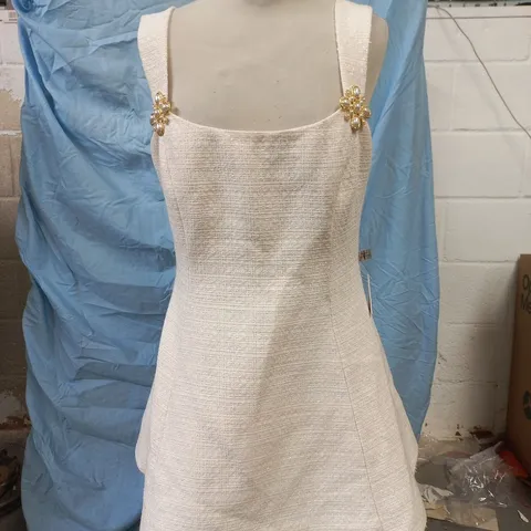 NADINE MERABI CREAM TEXTURED WOMEN'S DRESS – SLEEVELESS WITH FLORAL STRAP EMBELLISHMENTS SIZE MEDIUM