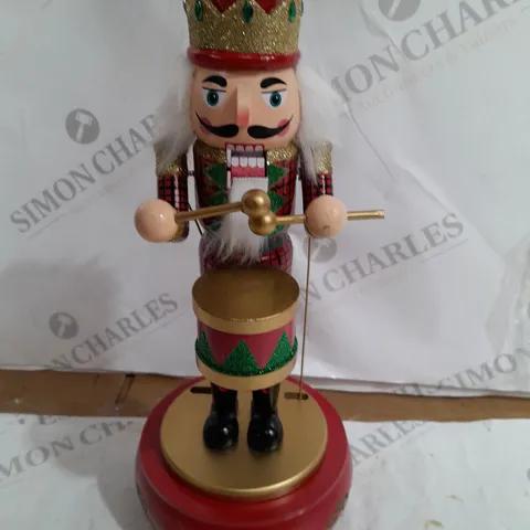 FESTIVE 32CM WOODEN ANIMATED MUSICAL NUTCRACKER