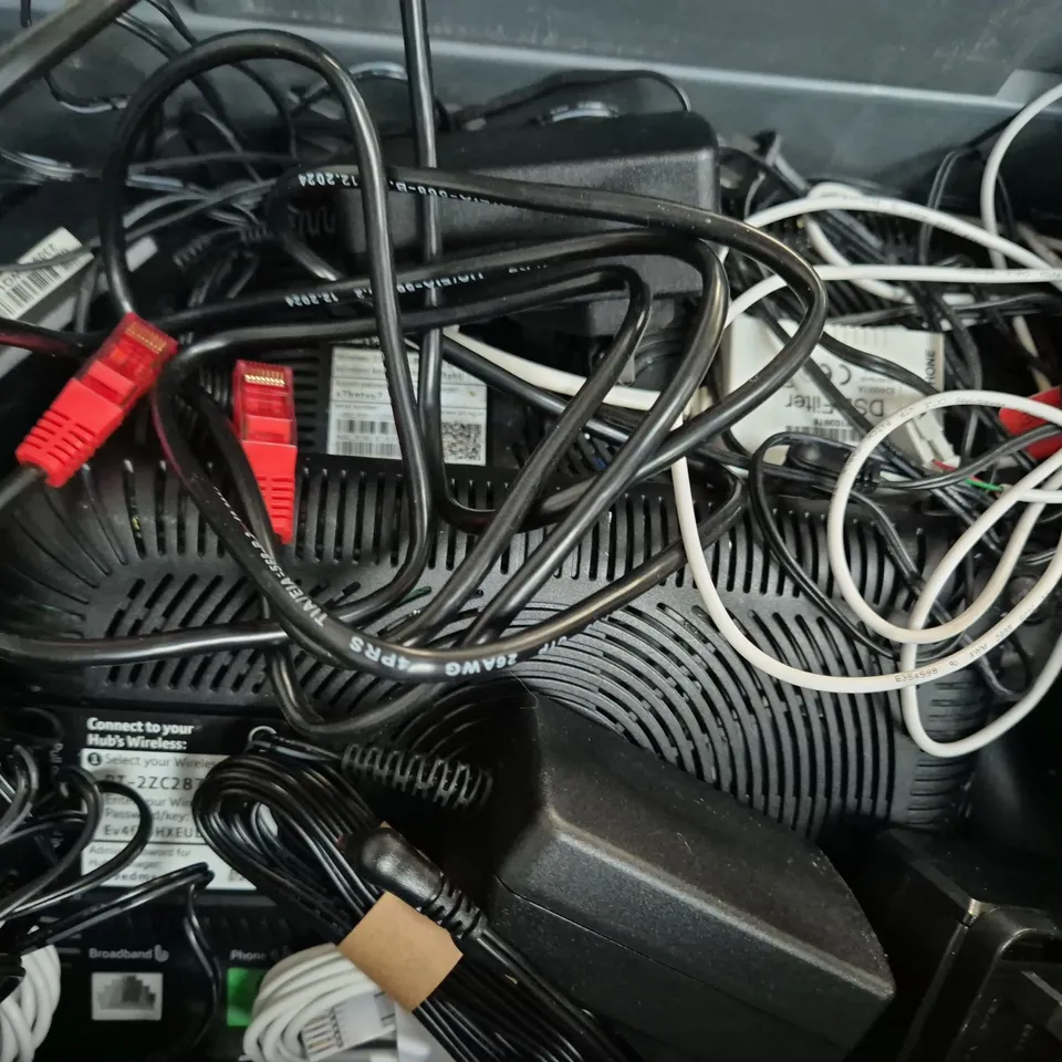 APPROXIMATELY 10 ASSORTED HOUSEHOLD ITEMS TO INCLUDE MOTOROLA LANDLINE, VARIOUS CABLES AND POWER ADAPTERS, ETC