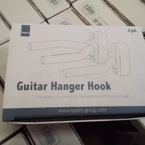 BOX CONTAINING APPROXIMATELY 40 X2 PKS OF GUITAR HOOKS