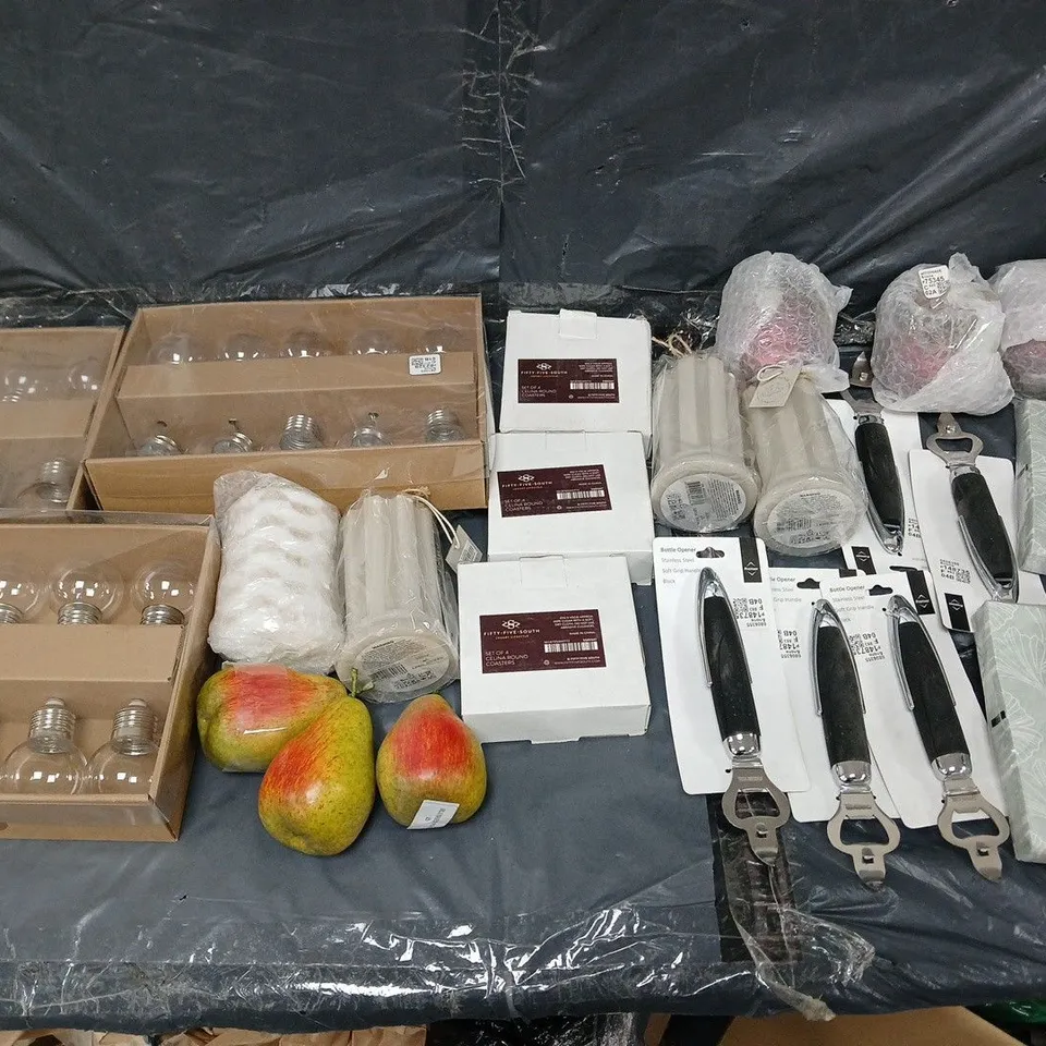 LARGE BOX OF APPROXIMATELY 10 ASSORTED HOUSEHOLD GOODS TO INCLUDE BULBS, COASTERS, AND BOTTLE OPENERS ETC. 