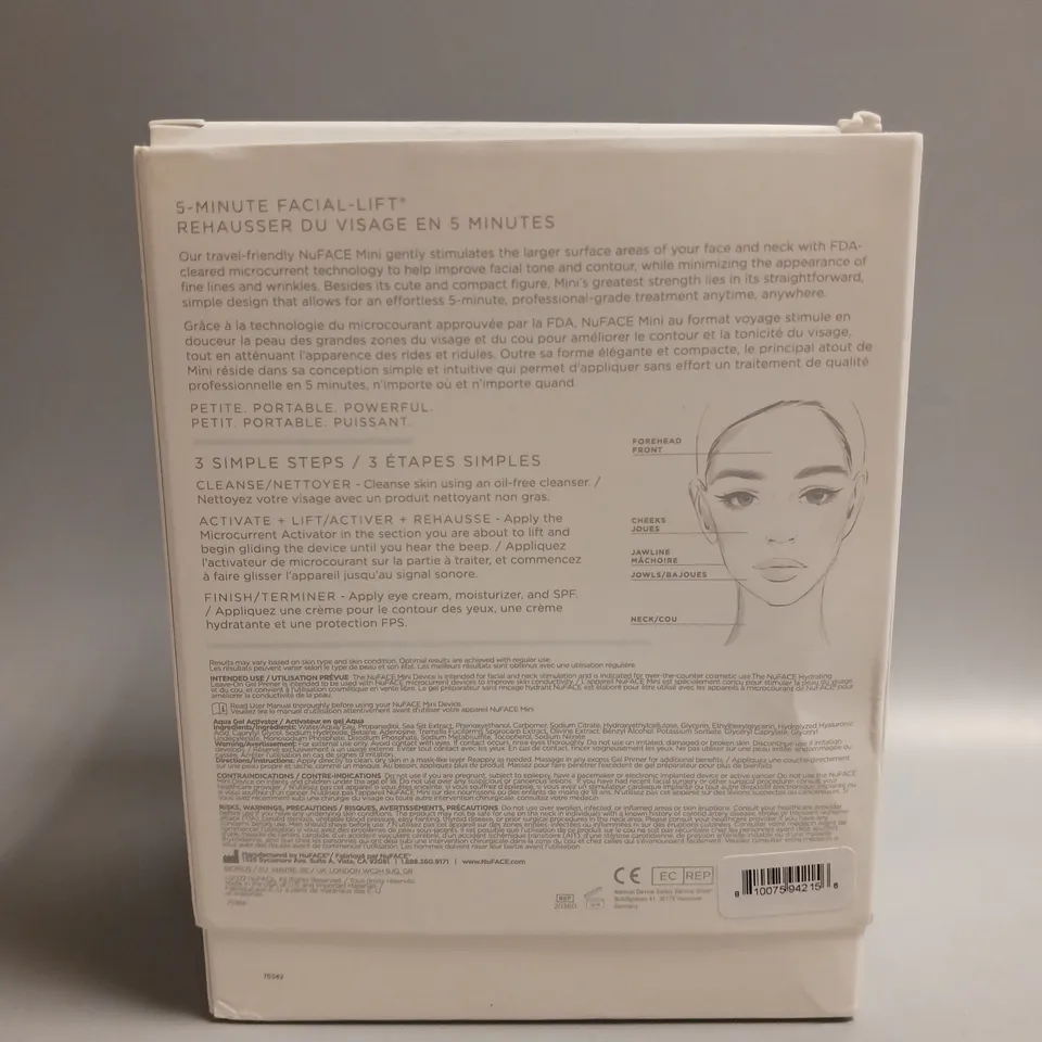 BOXED NUFACE MINI PETITE FACIAL TONING DEVICE WHITE AND GREY INCLUDES HYDRATING AQUA GEL, CHARGING CABLE AND 2 PLUG ADAPTORS