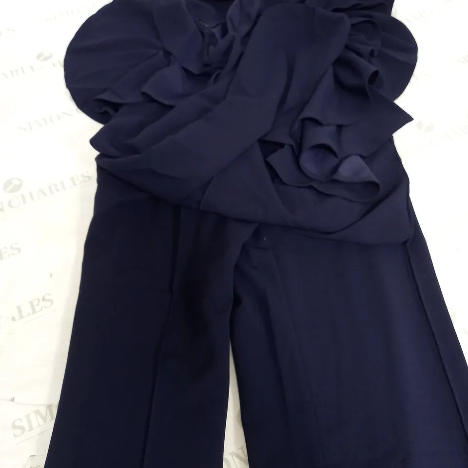 GIRL IN MIND ZOEY ONE SHOULDER EXAGGERATED RUFFLE JUMPSUIT IN NAVY - SIZE 18