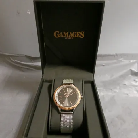 BOXED GAMAGES FLUTED DIAMOND BLACK DIAL WATCH