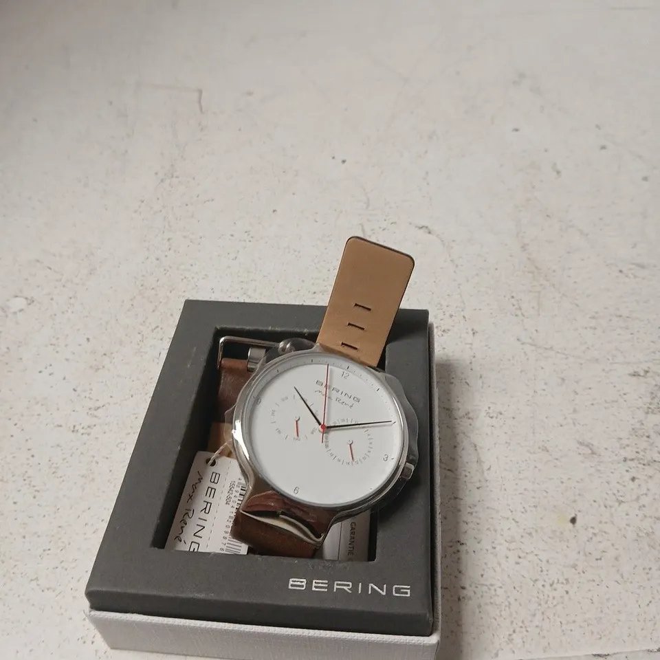 BERING WRISTWATCH WITH BROWN LEATHER STRAP – BOXED - DAMAGED STRAP
