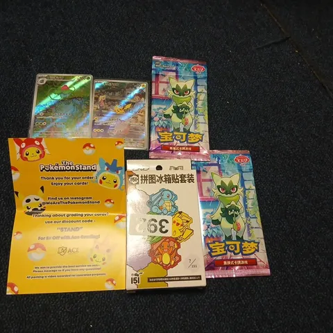 ASSORTED POKEMON PRODUCTS TO INCLUDE; POKEMON S-CHINESE 151 PUZZLE FRIDGE MAGNET SET, TWO CARDS AND TWO POKEMON GEM PACK VOL. 5 CBB5C - SIMPLIFIED CHINESE VERSION