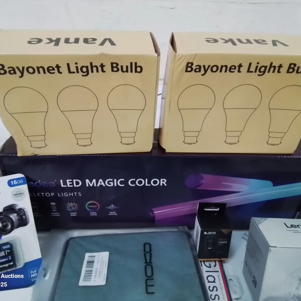 BOX CONTAINING LARGE AMOUNT OF BOXED ELECTRICAL ITEMS TO INCLUDE: EARPHONES, VARIOUS LIGHT BULBS, PS5 GAMES, PHONE CASES, CHARGING ADAPTORS, LED MAGIC COLOUR DESK LAMP, SPOTLIGHTS ETC.