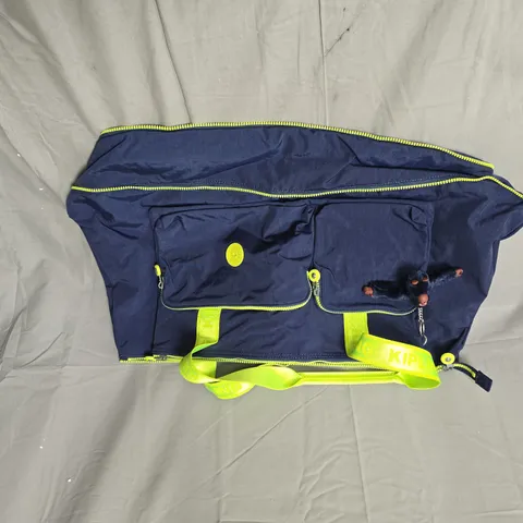 KIPLING NAVY  BAG WITH NEON YELLOW ACCENTS AND MONKEY CHARM
