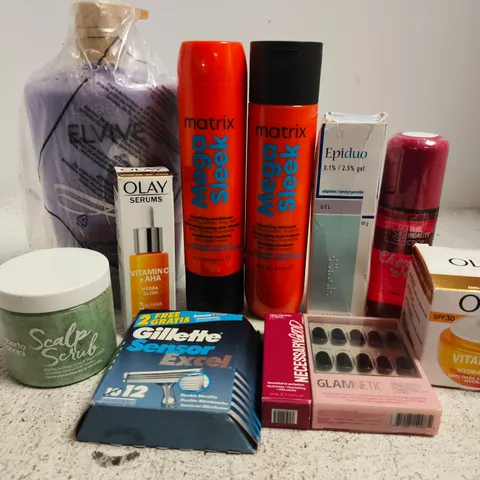 APPROX 12 ASSORTED BEAUTY PRODUCTS TO INCLUDE OLAY SERUM, MATRIX SHAMPOO, FALSE NAILS, ETC