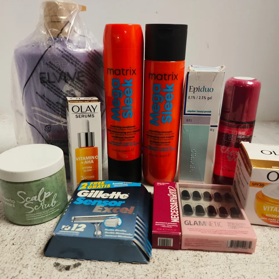 APPROX 12 ASSORTED BEAUTY PRODUCTS TO INCLUDE OLAY SERUM, MATRIX SHAMPOO, FALSE NAILS, ETC
