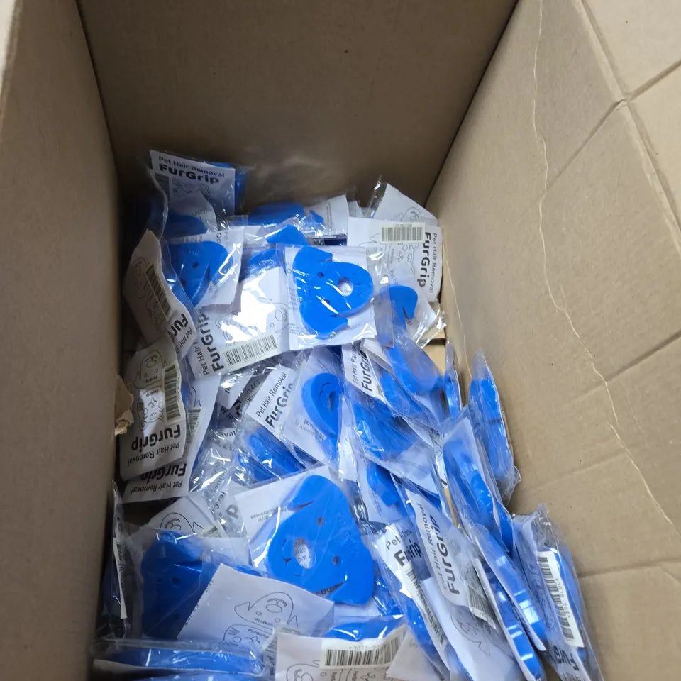 APPROXIMATELY 50 FURGRIP DOG LAUNDRY PET HAIR REMOVERS
