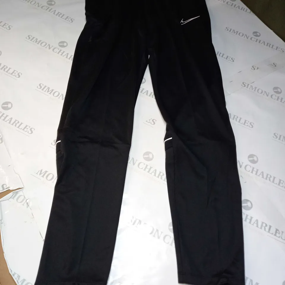 NIKE ACADEMY PANTS IN BLACK - SIZE 12 (M)