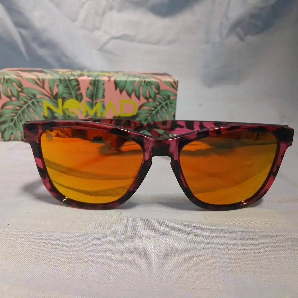 NOMAD SUNGLASSES WITH COLOURFUL MARBLED FRAME AND ORANGE LENSES