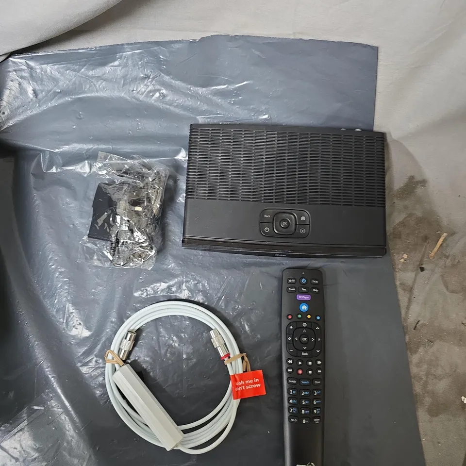 APPROXIMATELY 15 ASSORTED HOUSEHOLD ITEMS TO INCLUDE REMOTES, ARIEL CABLES, PLUG ATTACHMENTS & TV BOX