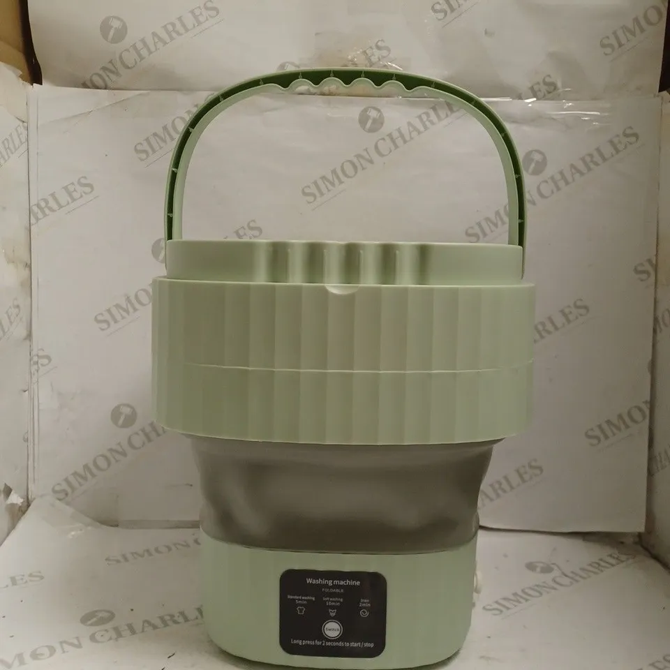 BOXED FOLDABLE WASHING MACHINE.