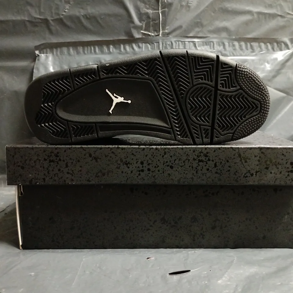 BOXED PAIR OF NIKE AIR JORDAN 4 RETRO SHOES IN BLACK SIZE UK 5