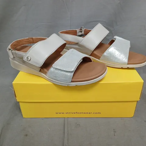 BOXED PAIR OF STRIVE OPEN TOE SANDALS IN GREY/SILVER SIZE UK 7